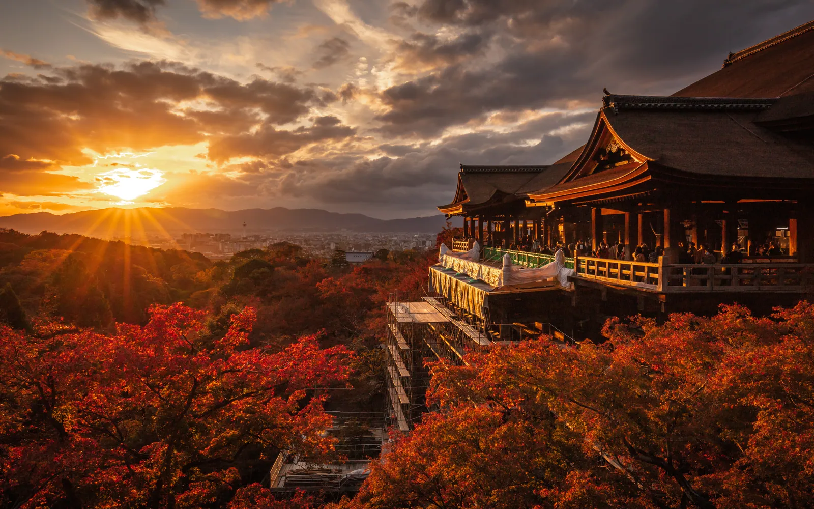 Kiyomizu-dera temple at sunrise surrounded by autumn maples